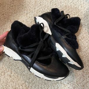 All black brand. Fur lined shoes.